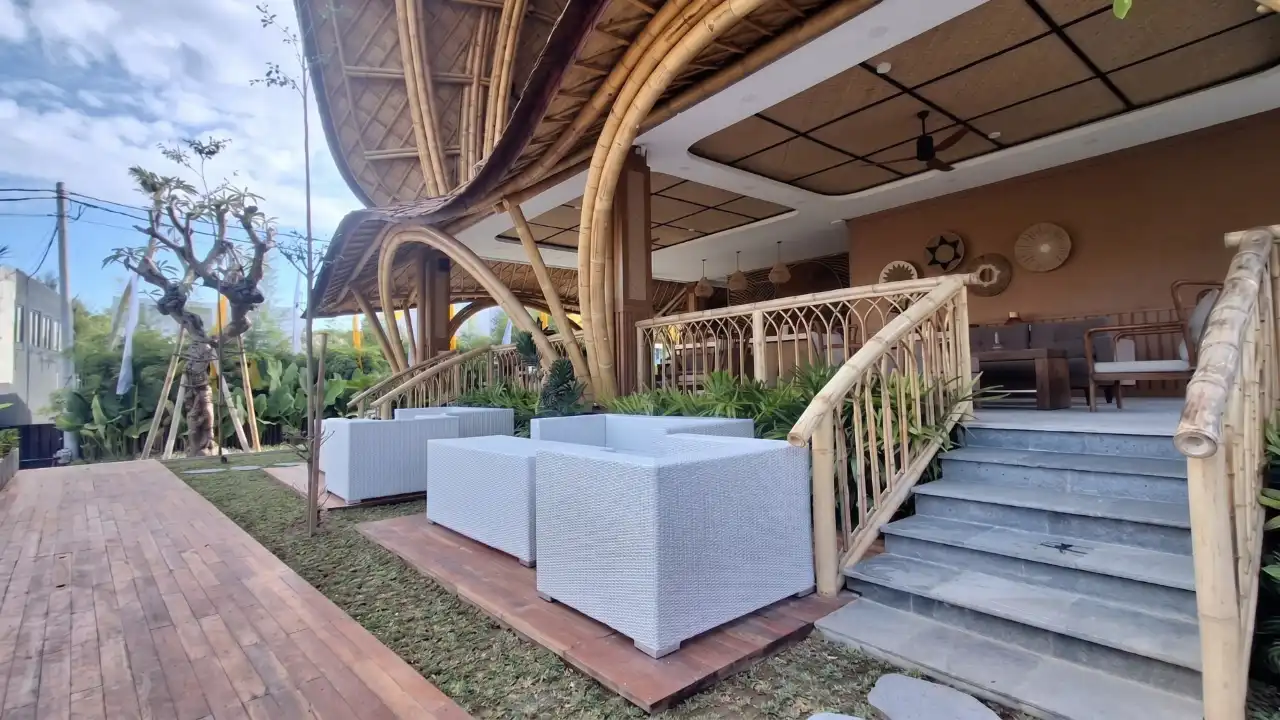 Lokalé bamboo arch exterior with garden seating