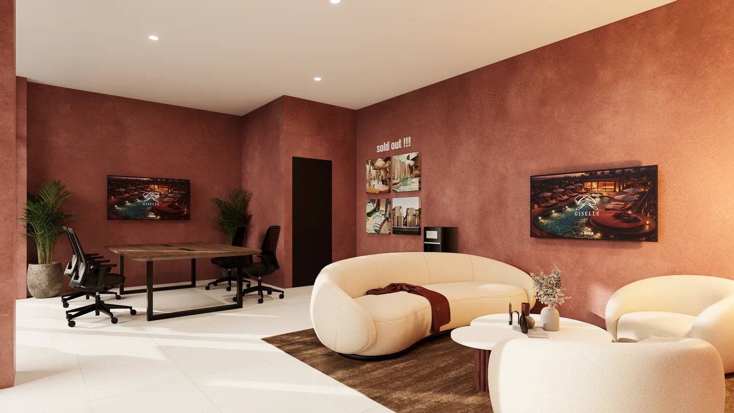 Marketing gallery interior in Seseh, Bali, with terracotta plaster walls, a meeting table, a curved lounge sofa and a wall of framed development renders, designed by Bali Best Design